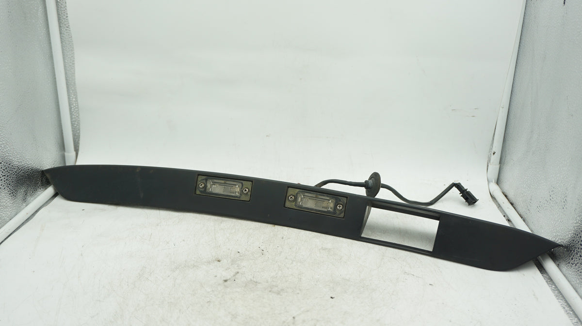 VW CADDY LICENSE PLATE LIGHTS AND TRIM 2K0827574