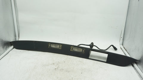 VW CADDY LICENSE PLATE LIGHTS AND TRIM 2K0827574